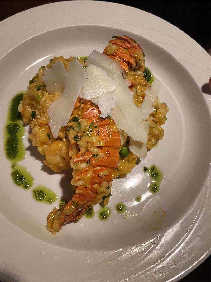 Risotto topped with lobster tails
