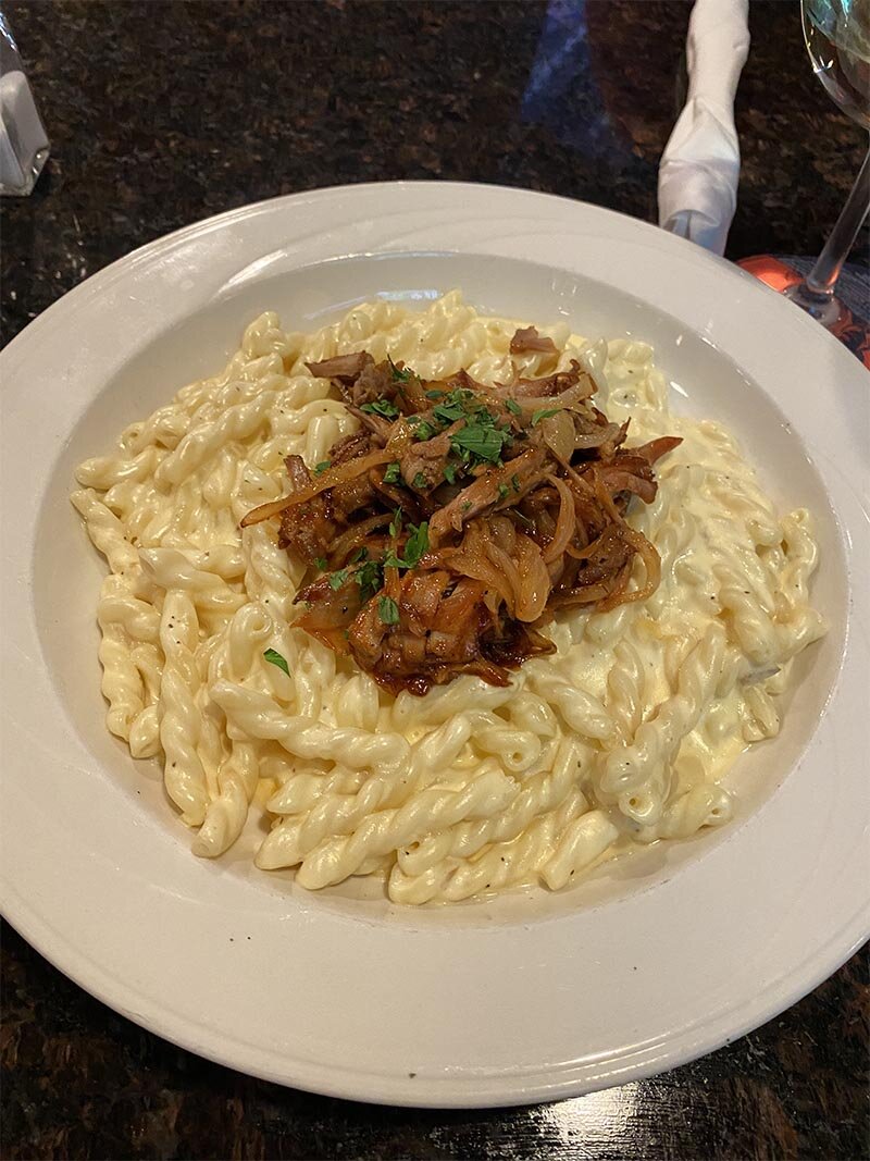 Pasta topped with short rib